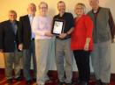 Handiham Program Coordinator Pat Tice, WA0TDA (center), receives the ARRL President’s Award. (L-R) ARRL Minnesota SM Skip Jackson, KS0J; ARRL Dakota Division Director Greg Widin, K0GW; ARRL President Kay Craigie, N3KN; Pat Tice, WA0TDA; Susie Tice, and ARRL International Affairs VP Jay Bellows, K0QB.